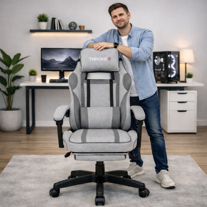 Дизайнерське геймерське крісло з тканини до 130 кг з масажною подушкою, підніжкою ThroneX світло-сірий з графітом linen 005