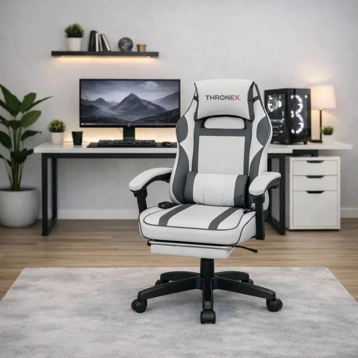 Дизайнерське геймерське крісло до 130 кг з масажною подушкою, підніжкою ThroneX біле з графітом PVC 002